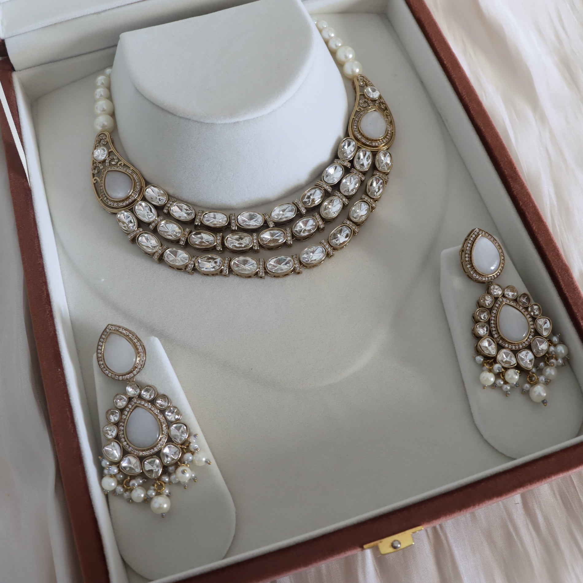 Jewelry set with necklace and earrings in a box