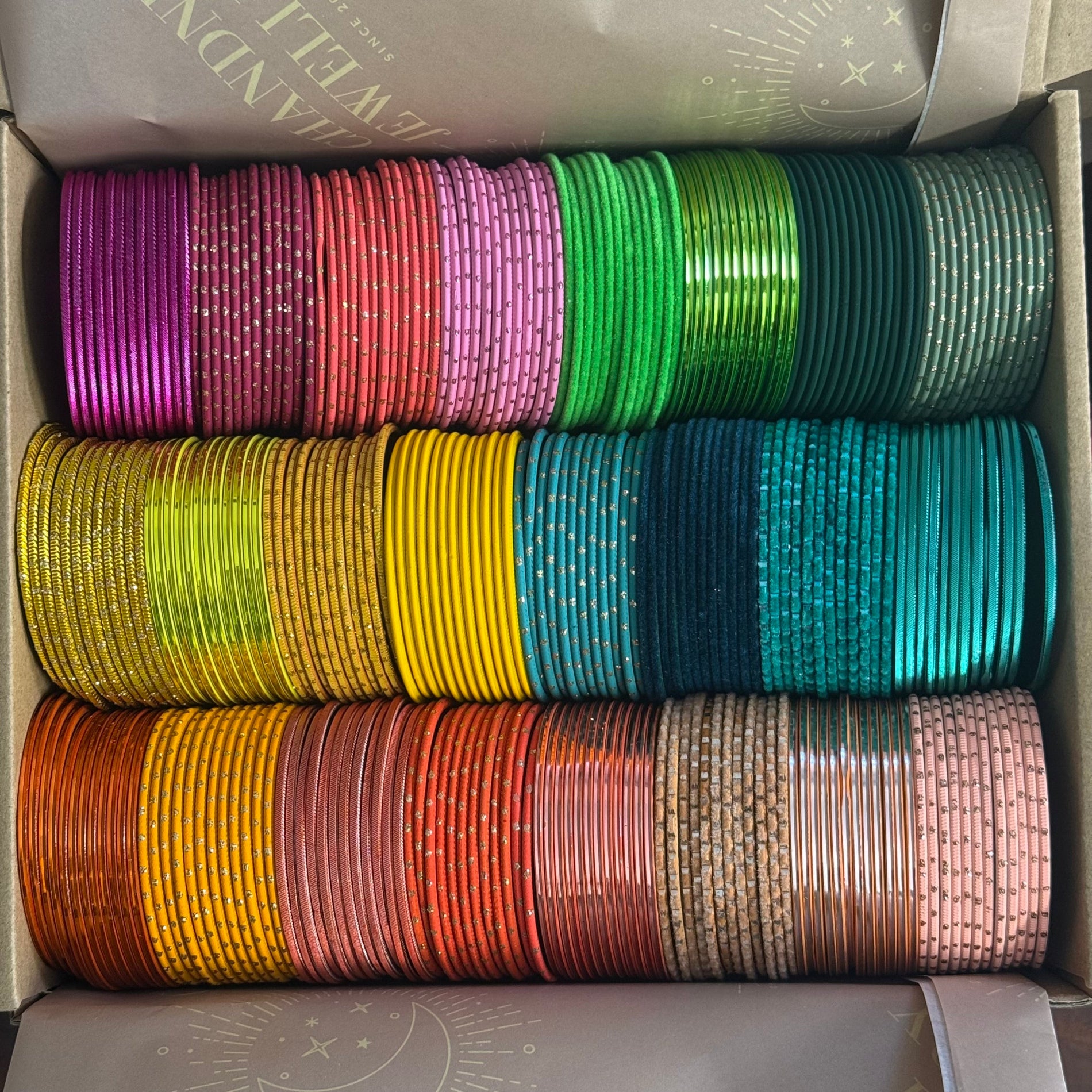 Colorful bangles stacked in a box