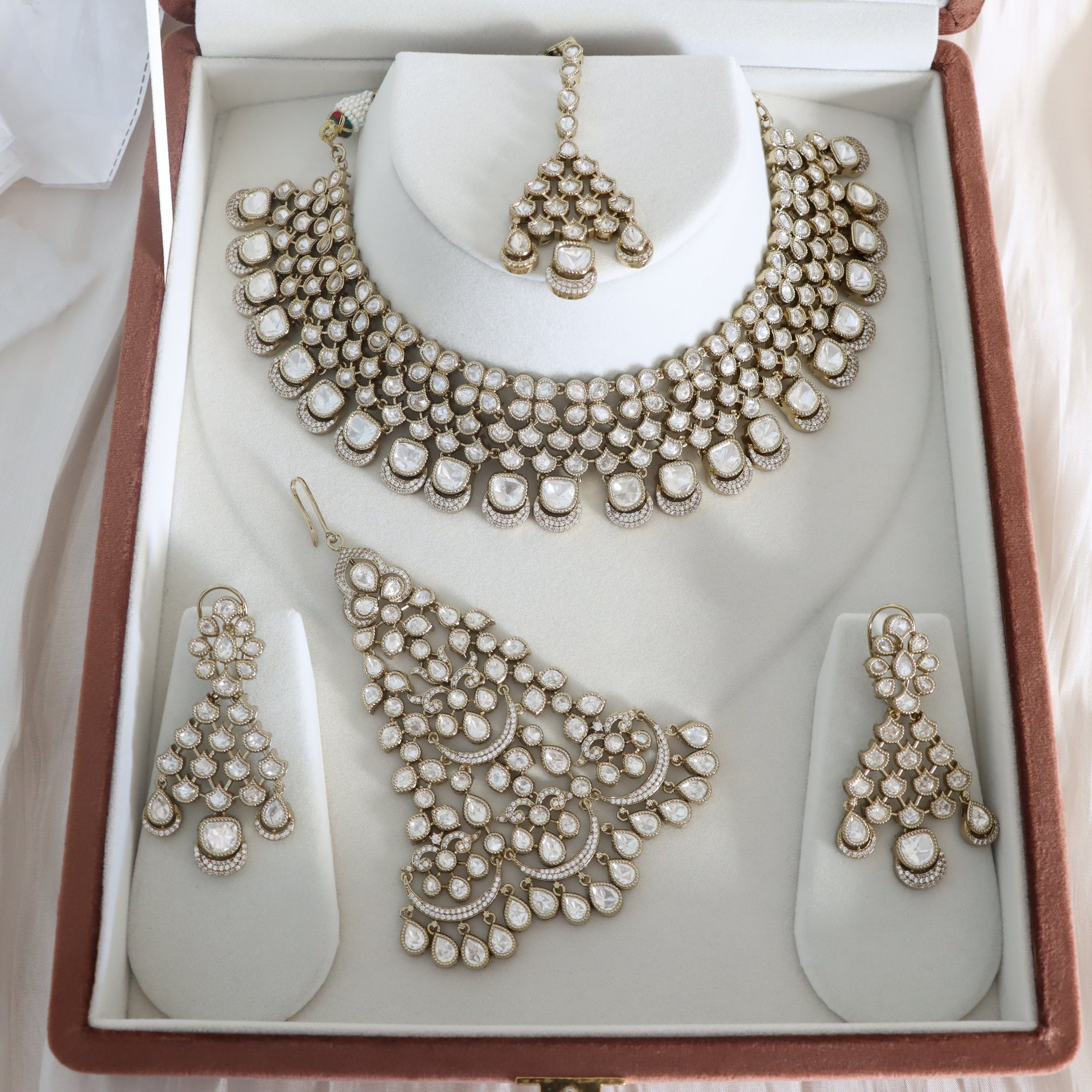 Jewelry set with necklace, earrings, and choker in a box